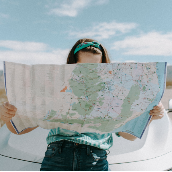 Woman looking at map