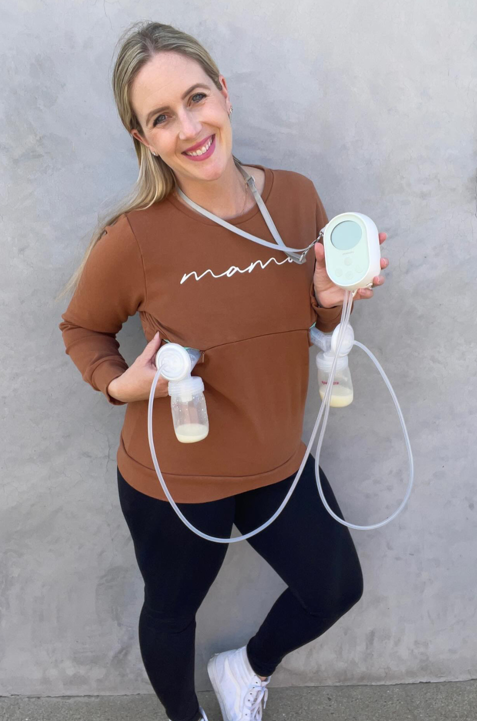 Mom pumping in nursing shirt