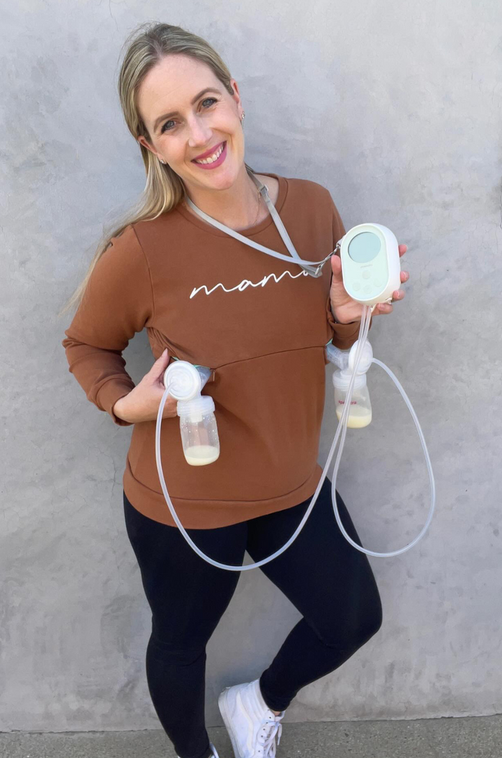 Mom pumping in nursing shirt