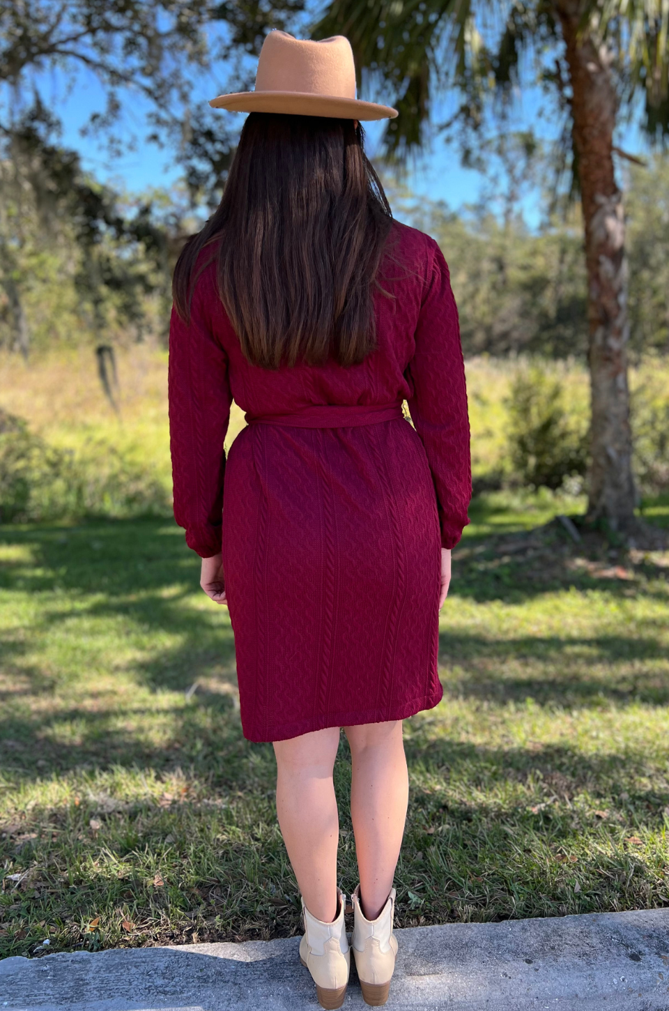 Back view of nursing sweater dress in dark red
