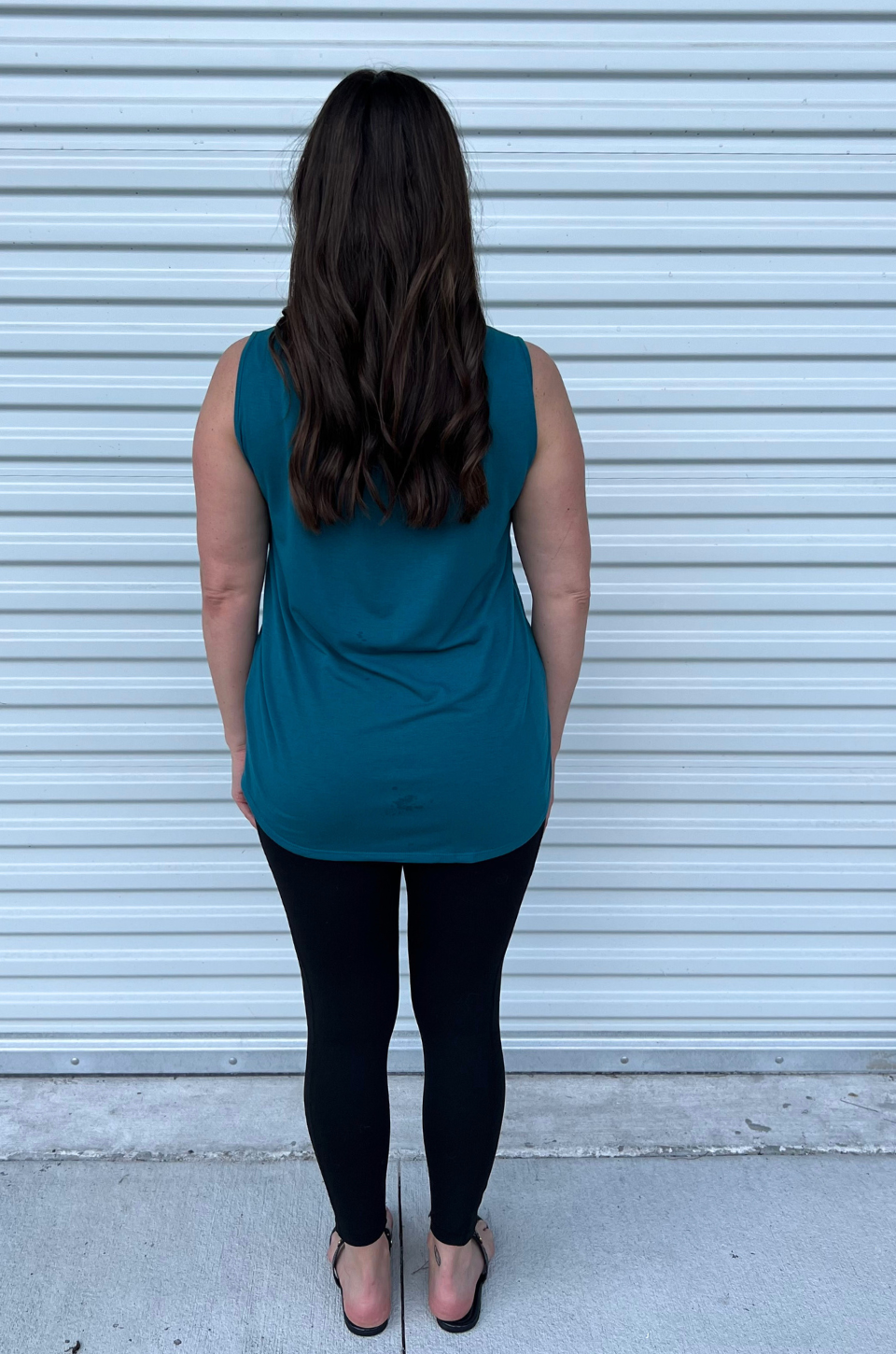 Asymmetrical tank top back view in teal