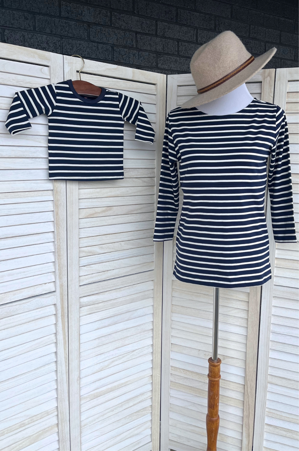 navy striped top and with baby shirt